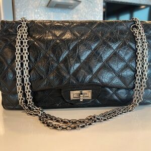 This is a Chanel 2.55 Reissue 227 Double Flap in Calfskin